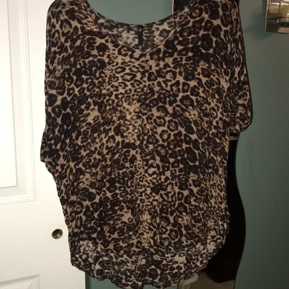 Cheetah print blouse.